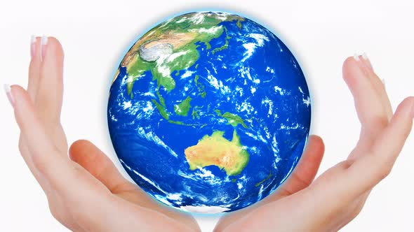 Rotated 3d Realistic Planet Earth On The Hand White Background
