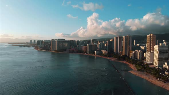 Aerial drone footage of Honolulu, Hawaii. Beautiful real estate, buildings in the city. Palm trees