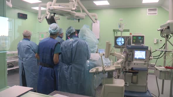 Doctor Video Footage - Group Of People In A Medical Field Inside An Operating Room