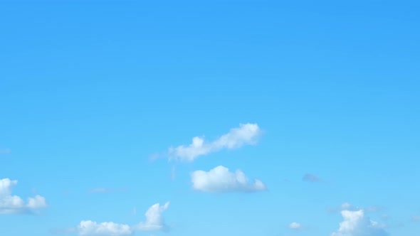 4K UHD : Time lapse of beautiful blue sky with clouds background