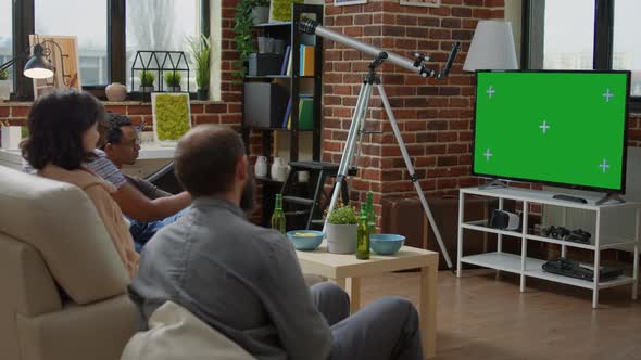 Young People Using Green Screen Technology on Television