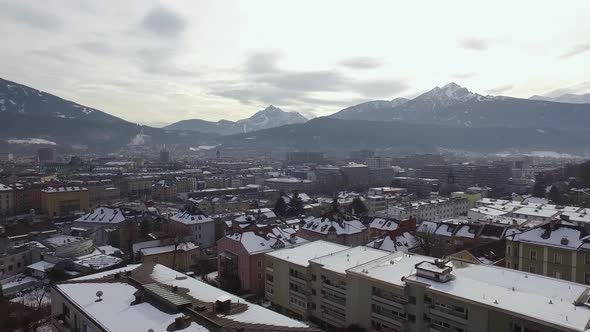 Aerial view of Innsbruck surrounded by mountains