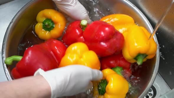 Hands Washing Bell Peppers.