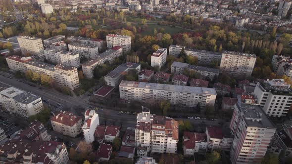 Urban View of Living Houses and Parks with Colorful Autumn Tree Tops