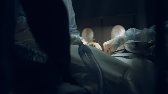 Medical Team Hands Performing Operation Using Sterile Surgical Tools Close Up