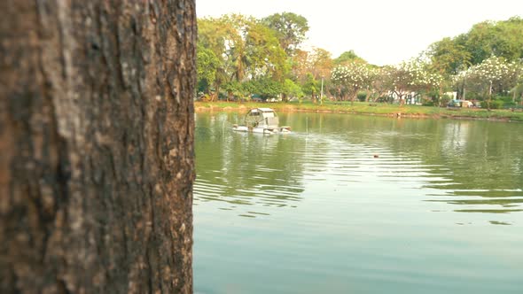 Exploring Lumpini Park in Bangkok - King Rama Statue and the lake