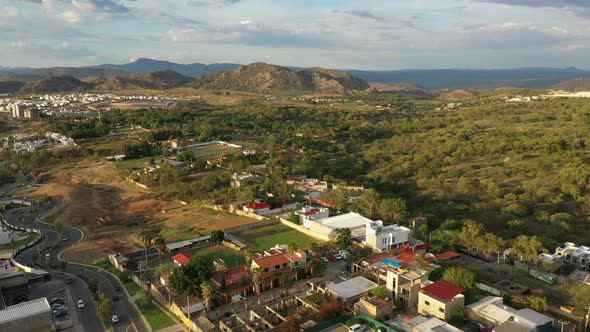 Complex of houses outside the city cerro occidente cloudy sky urban forest landscape horizon