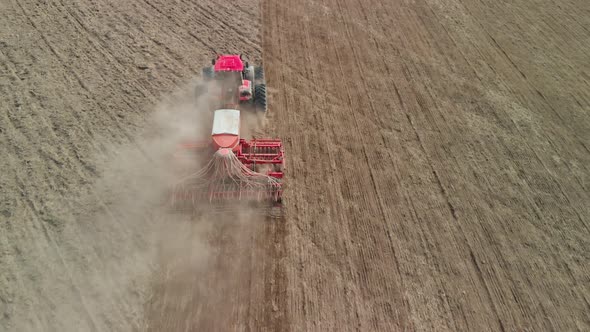 Tractor with a Sowing Unit Sows Grain Crops