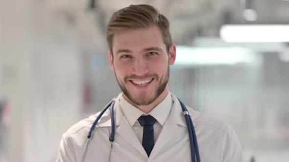 Young Male Doctor Talking on Video Call