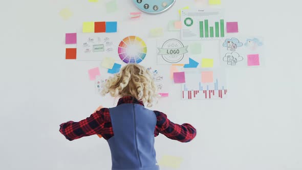 Kid as business executive with sticky notes on his body 4k