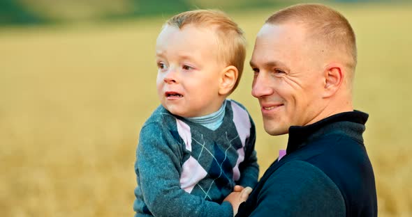 Portrait of a Caring Father with His Son