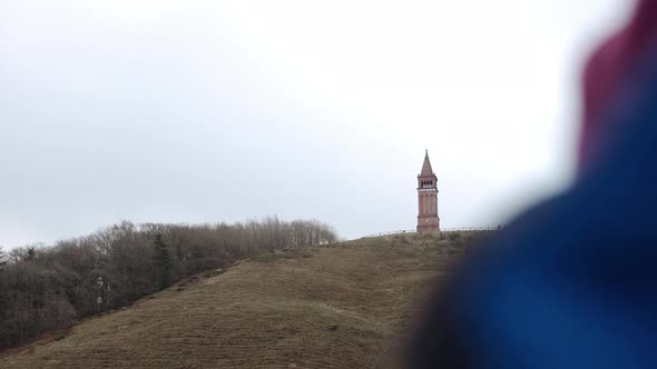 Tourist with Enjoys View of the Tower on Himmelbjerget Hill Denmark