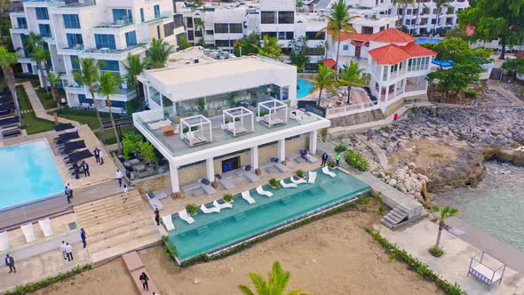 Hotels And Pools At The Ocean Club, Playa Imbert, Dominican Republic - aerial drone shot