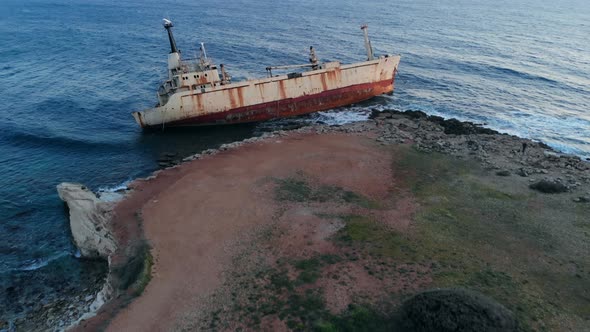 Aerial View of Shipwrecked Ship Lying Near Seashore