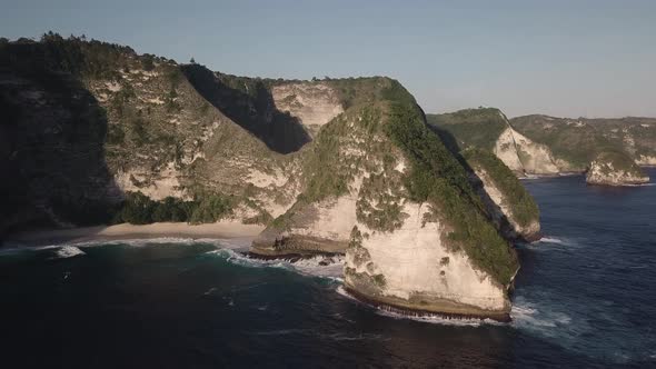 Aerial View at Sea and Rocks. Turquoise Water Background From Top View