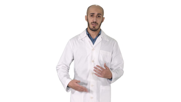 Friendly Male Doctor Walking and Talking Looking in Camera