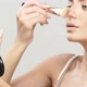 Beautiful Girl Working with Brush on Her Nose Self Mua - VideoHive Item for Sale