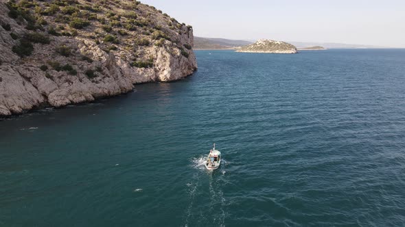 Aerial Boat Floating On Bay