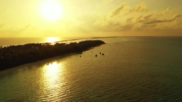 Aerial nature of paradise coastline beach adventure by blue sea and white sand background of a dayou