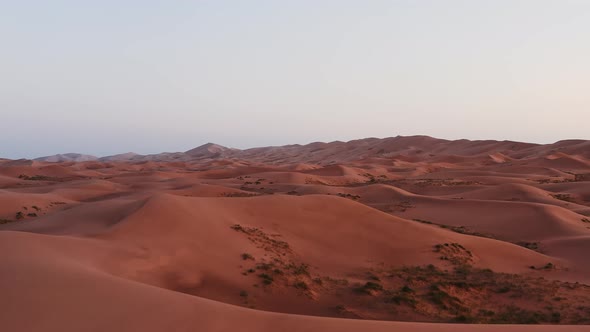 Sunrise Over the Sand Dunes in the Desert Aerial View