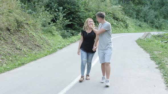 Couple walking on a road