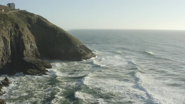 Rocky Oregon coastline with ocean waves crashing