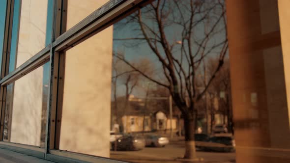 Blurred reflections of city street with cars background