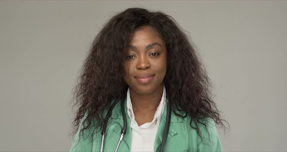 Happy Black Doctor Smiling for Camera