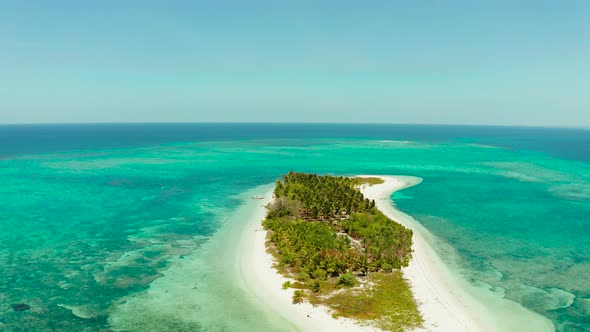 Travel Concept with a Sandy Beach and Blue Sea