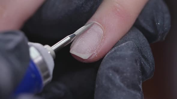 Closeup Slow Motion Shot of Hardware Manicure in a Beauty Salon