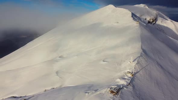 Flying back over the snowy mountain peaks