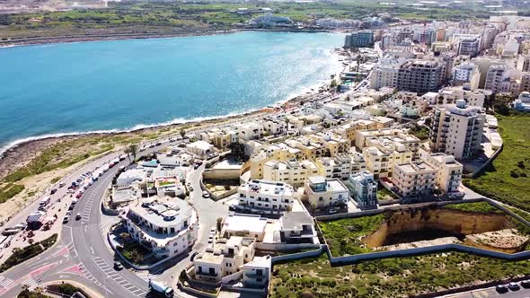 Exotic coastal town of St. Paul Bay with beautiful buildings on sunny day, aerial view