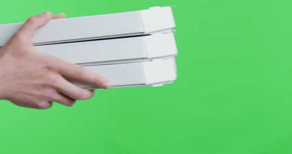 Courier Offering Pizza Order, Chroma Key Background, Side View