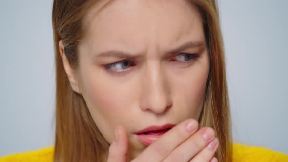 Closeup Sick Young Woman Coughing at Camera on Grey Background