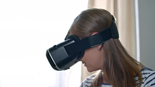 Woman in VR Headset Looking Around