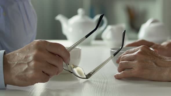 Senior Couple on Date in Cafe, Interest Club for Senior People, Hands Close-Up