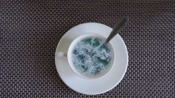 Sea Waves in a Cup