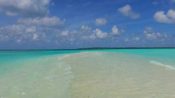 Empty scenery of island beach by ocean with sand background near sandbank