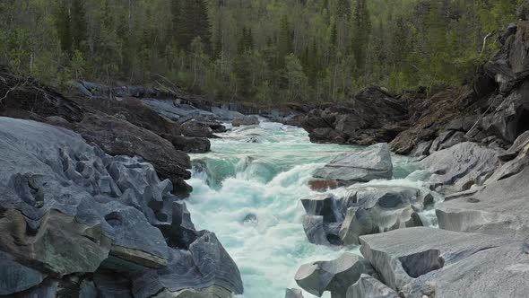 Drone move above  mountain river Glomaga, Marmorslottet, Mo i Rana,Norway