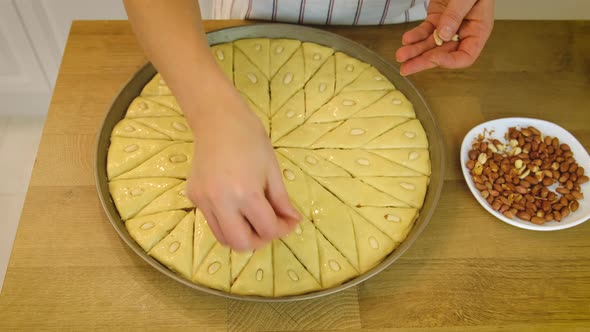 A Woman is Preparing Baklava in the Kitchen