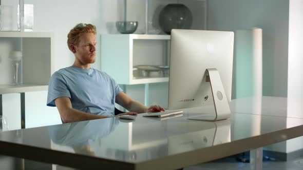 Manager Checking Report Computer at Home Office