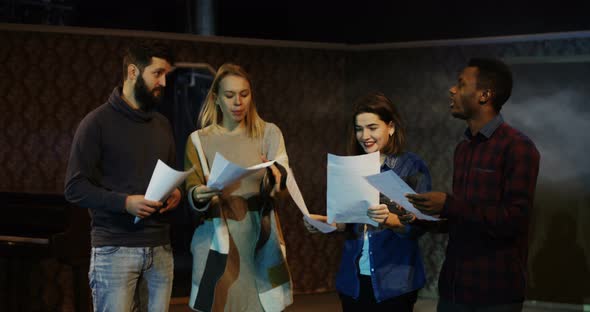 Actors Arguing During Rehearsal in a Theater