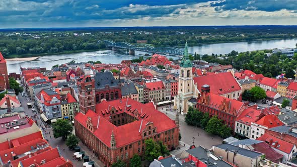 Summer view of Torun old town and Jozef Pilsudski bridge.