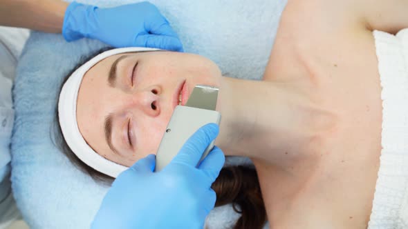 Beautiful Woman Getting a Treatment in the Beauty Salon