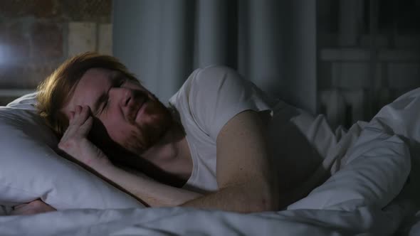 Headache Depression Restless Man Sleeping at Night in Dark Room