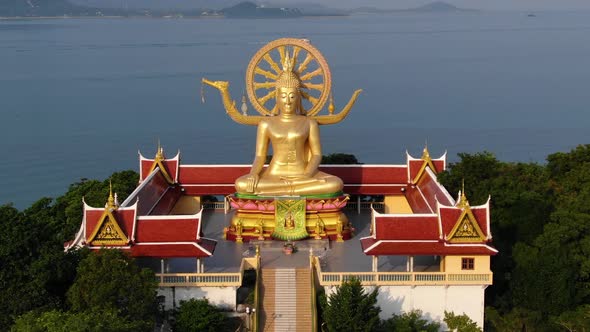 Thailand landmark. Aerial view of golden big Buddha temple