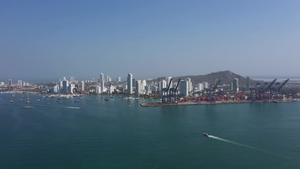 The Cartagena Cargo Harbor with City Panorama Aerial View