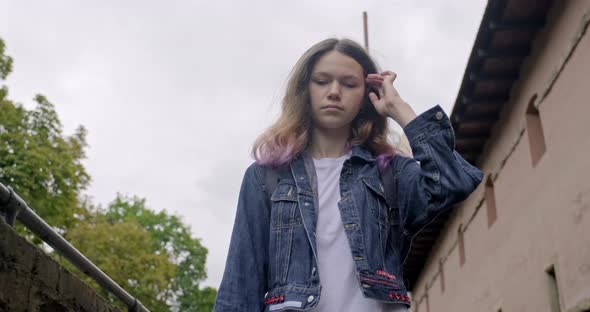 Teenage Girl Walking. Emotion Depression, Sadness Gives Way To a Smile, Joy, Happiness