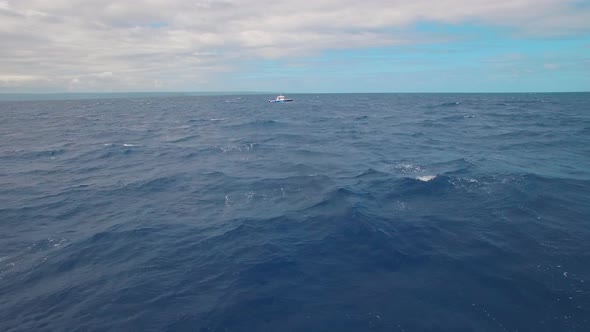 Aerial View of Abandoned Boat in the Middle of Tropical Sea and Endless Horizon