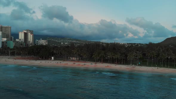 Aerial drone footage of Honolulu, Hawaii. Beautiful real estate, buildings in the city. Palm trees